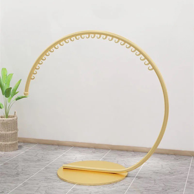 Golden half moon clothes hanger