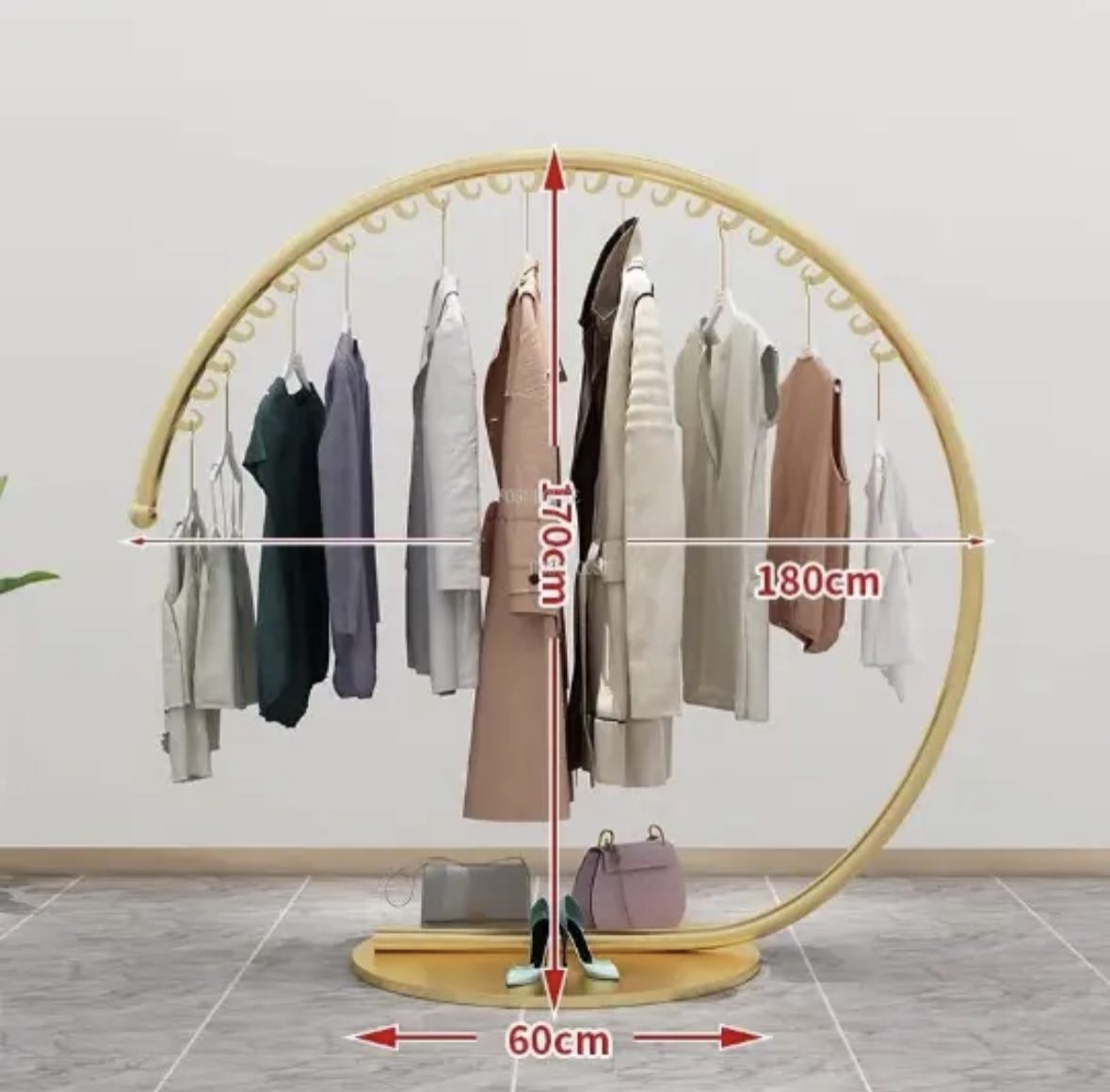 Golden half moon clothes hanger