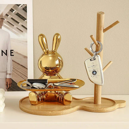 Golden rabbit holding things